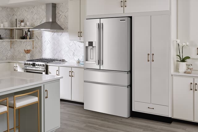 Front view of a Frigidaire refrigerator in a modern kitchen